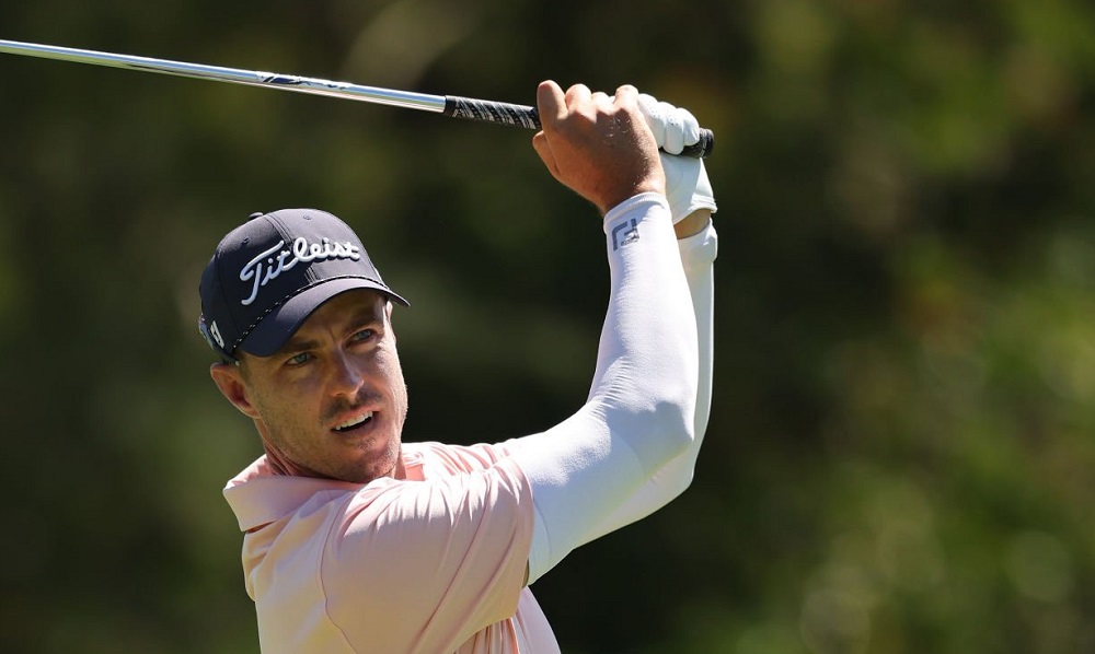 Bogey-free 2nd round keeps Hollick in top 20 in Australian Open