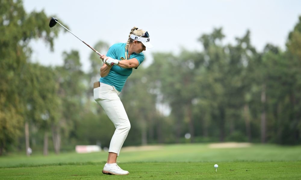 Alexander in 4-way share of 1st-round lead in Italy